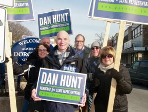 Dan Hunt: Dan Hunt, above holding sign is pictured with supporters during a standout in Adams Corner last weekend. The 33 year-old attorney was the first candidate to announce plans to run for the 13th Suffolk seat.